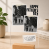Father's Day dual photo acrylic plaque with black and white family photos on desk