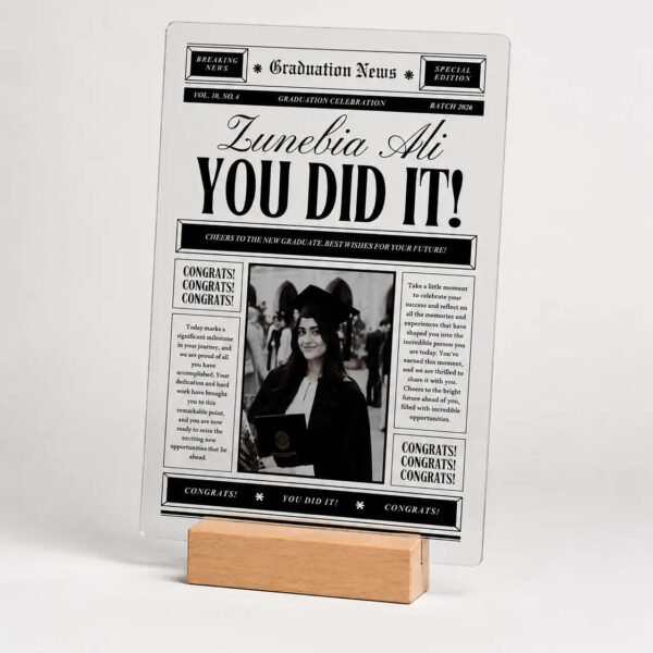 Vintage newspaper style graduation acrylic plaque with black and white photo on wooden stand