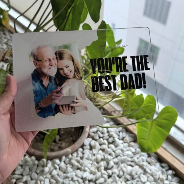 You're the best dad acrylic plaque held in hand near plant