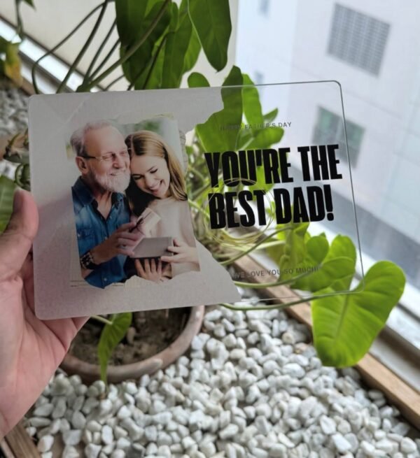 You're the best dad acrylic plaque held in hand near plant