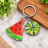 Custom UV Printed Double Charm Keychain UV spot printed double charm keychain with watermelon and lime designs, featuring one-side printing.
